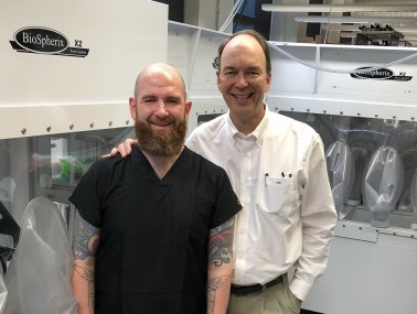 Drs. Ed Stone and Budd Tucker in front of the BioSpherix units